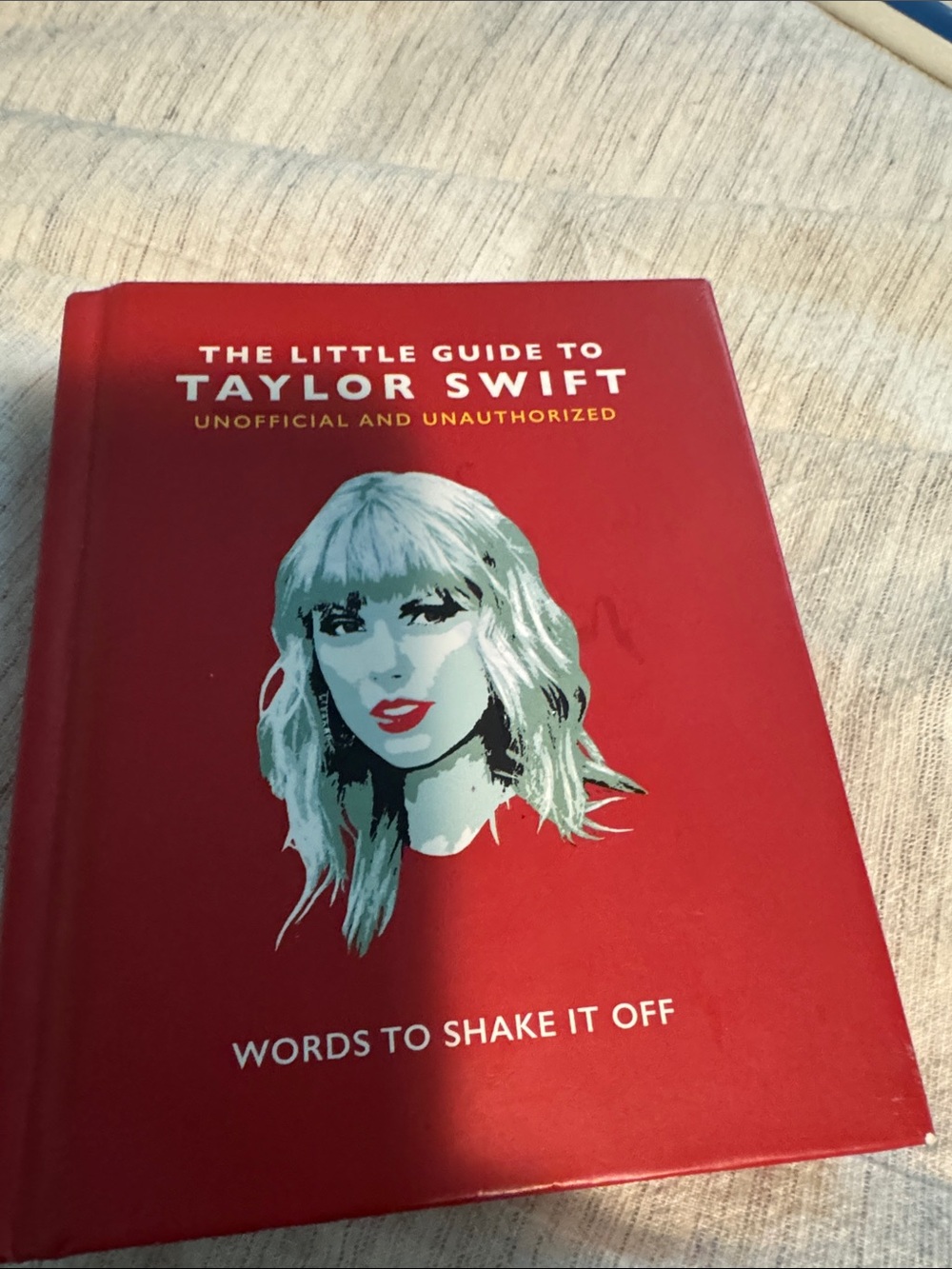 Red Taylor Swift Graphic Hardcover book- The Little Guide to Taylor Swift